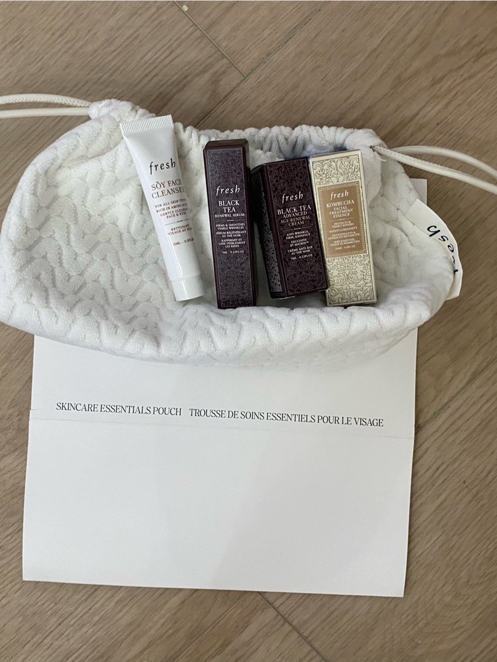 fresh White Drawstring Pouch with Assorted Lip & Body Treatments